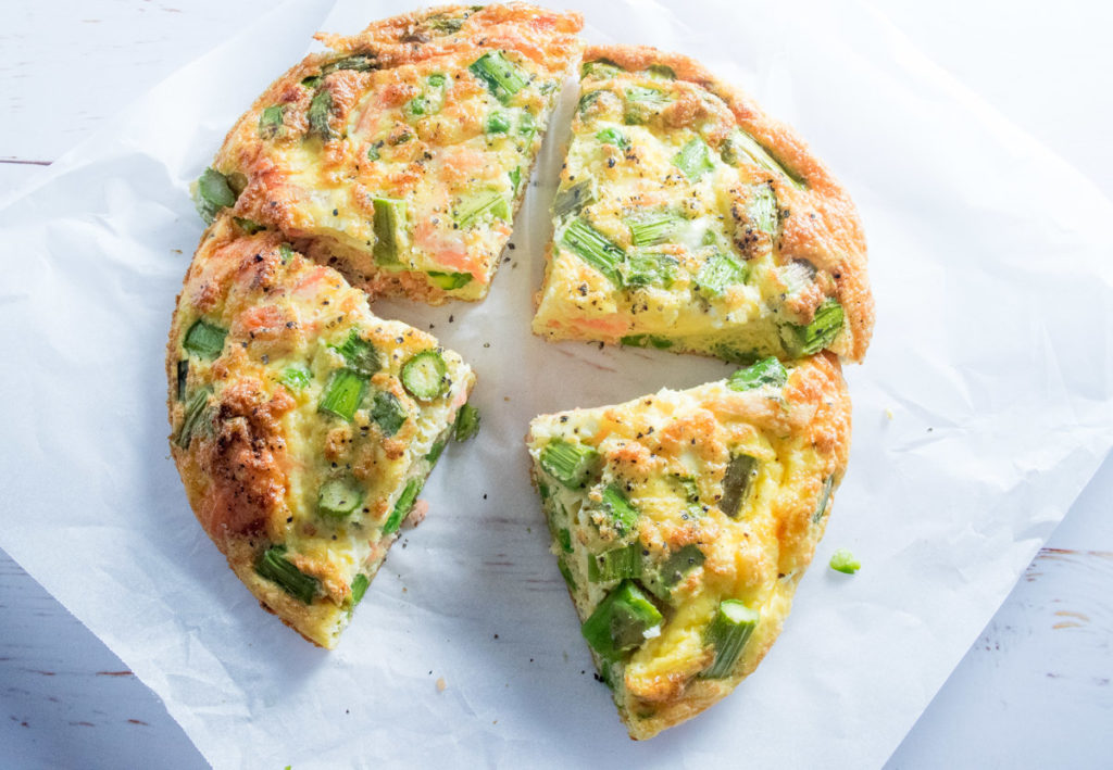 This incredibly quick and easy oven baked Salmon, Asparagus and Pea Frittata recipe makes a delicious and simple weeknight dinner or weekend lunch. 